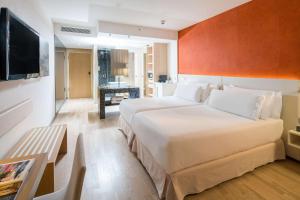 Uma cama ou camas num quarto em Barceló Hamburg