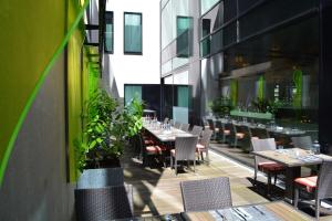 Um restaurante ou outro lugar para comer em Barceló Hamburg