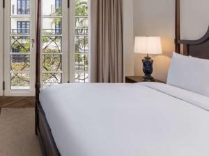Cama ou camas em um quarto em Sofitel Legend Casco Viejo, Panama City