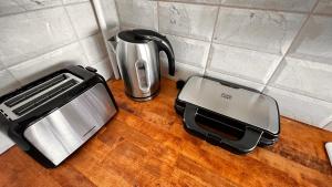 Køkken eller tekøkken på DAS Penthouse Otopeni Airport