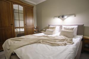 Postel nebo postele na pokoji v ubytování Hotel Pernigele