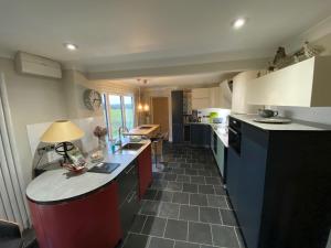 a kitchen with a counter and a counter top at Beautiful country house in Inkpen in Inkpen