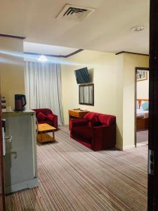 TV a/nebo společenská místnost v ubytování Al Jazeerah Hotel