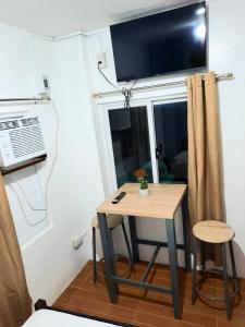 Kuchyň nebo kuchyňský kout v ubytování Studio type unit - Host Homes Apitong