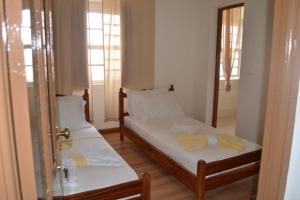 Un pat sau paturi într-o cameră la Hotel POUSADA Brava