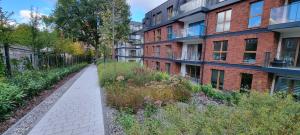 Vonkajšia záhrada v ubytovaní Apartament I Młyny Gdańskie blisko centrum