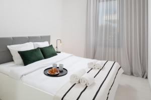 Posteľ alebo postele v izbe v ubytovaní Suncana Villa Sukosan