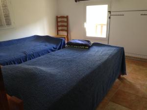 Ένα ή περισσότερα κρεβάτια σε δωμάτιο στο Maison Les Pieds dans l eau