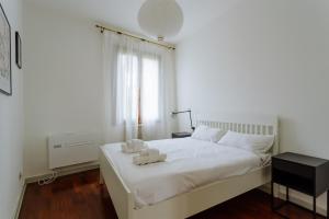 En eller flere senge i et værelse på Yourbanflat Vintage