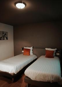 Postel nebo postele na pokoji v ubytování Hotel Ter Zuidhoek