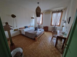 Postel nebo postele na pokoji v ubytování Residenza La Veranda a Rialto