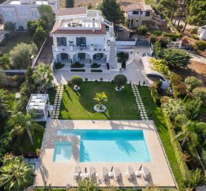 an aerial view of a house with a swimming pool at La Dimora degli Angeli in Tropea