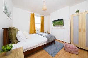 Ein Bett oder Betten in einem Zimmer der Unterkunft Calista by Oval