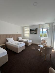 Postel nebo postele na pokoji v ubytování Naš Dom - MOTEL + 9 fotografií