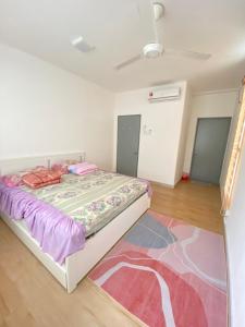 Postel nebo postele na pokoji v ubytování Apartment Putrajaya Presint 16