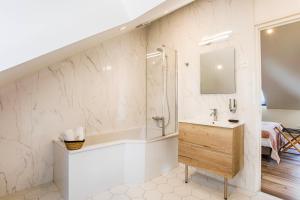 Kúpeľňa v ubytovaní Résidence LA VAGUE- Appartements Grand Confort -Vue mer - 2 à 6 personnes