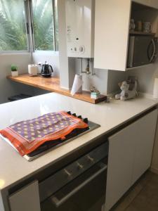 Kuchyň nebo kuchyňský kout v ubytování Apartamento Full