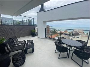 Rõdu või terrass majutusasutuses Departamento con vista al mar en Villa Francione 506