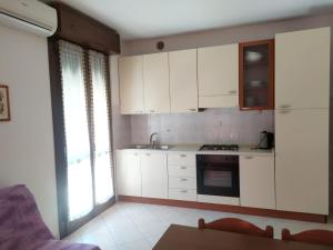 Kuchyň nebo kuchyňský kout v ubytování Residence Corallo