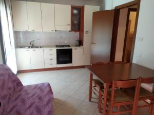 Kuchyň nebo kuchyňský kout v ubytování Residence Corallo