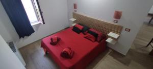 Postel nebo postele na pokoji v ubytování Pollino House