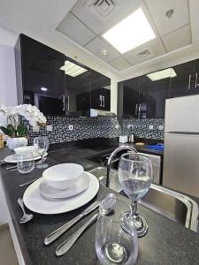Kuchyň nebo kuchyňský kout v ubytování Luxury Botanica Studio Apartment 75