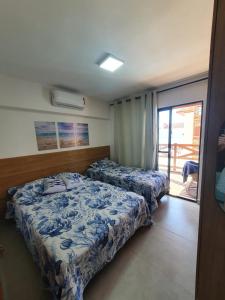 Katil atau katil-katil dalam bilik di Vila Atlântida 207B
