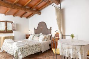 A bed or beds in a room at Agriturismo LaPievuccia
