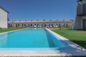 Villa Barcelos - BY BEDZY tesisinde veya buraya yakın yüzme havuzu