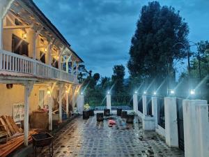 a courtyard of a house with lights on it at Balthali Heritage Inn in Panaoti