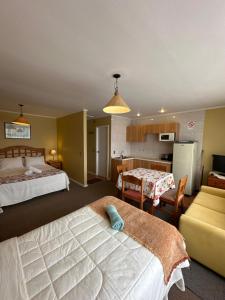 Cama o camas de una habitación en Apart hotel Terra Valdivia