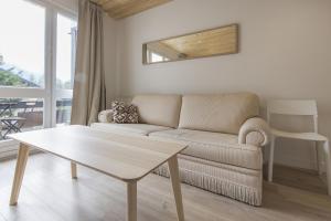 Posezení v ubytování Résidence Le Domaine du Jardin Alpin - Courchevel 1850