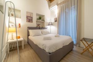 Кровать или кровати в номере Cozy and Modern Apartment Brera