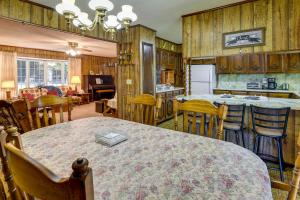 a kitchen and dining room with a table and chairs at Vintage Chipley Getaway on Large Private Property in Chipley