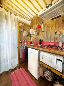 Kuchyň nebo kuchyňský kout v ubytování Casas D'Água Doce - Casa Ateliê