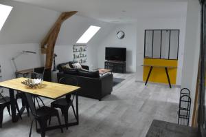 TV a/nebo společenská místnost v ubytování habitation style industruel