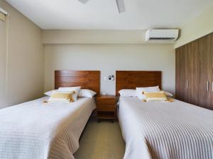 Postelja oz. postelje v sobi nastanitve Spacious and centrally apartment a few streets from the beach By Yeah