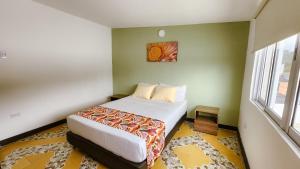 Letto o letti in una camera di Tuki Hostel & Lounge