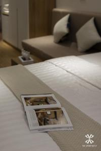 Giường trong phòng chung tại NB APARTMENT-LINH LANG