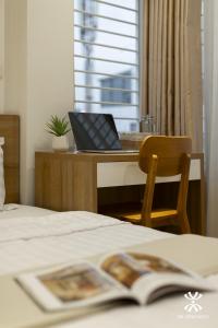 Giường trong phòng chung tại NB APARTMENT-LINH LANG