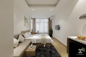 Giường trong phòng chung tại NB APARTMENT-LINH LANG