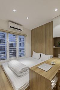 Giường trong phòng chung tại NB APARTMENT-LINH LANG