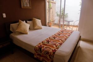 Letto o letti in una camera di Tuki Hostel & Lounge