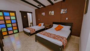 Letto o letti in una camera di Tuki Hostel & Lounge