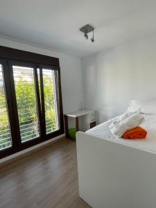 Posteľ alebo postele v izbe v ubytovaní LA MESA