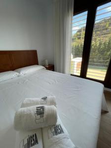 Posteľ alebo postele v izbe v ubytovaní LA MESA
