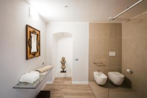 Koupelna v ubytování Calefati SUITE 54 + 37 fotografií