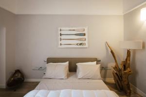 Postel nebo postele na pokoji v ubytování Calefati SUITE 54