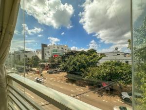 a view of a city street from a window at Hotel Phu Hai in Buon Ma Thuot