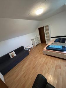 Postel nebo postele na pokoji v ubytování Appartement Römerstr 3 Zimer
